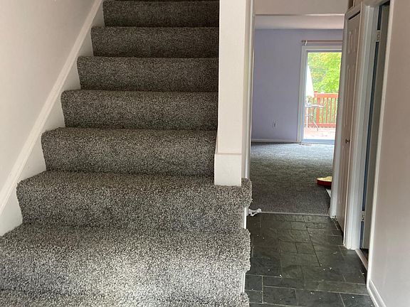 new carpet and steps in foyer