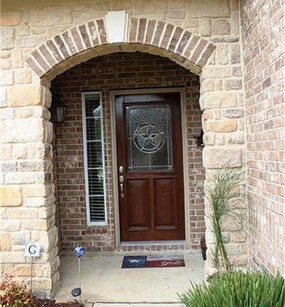 This house has a stone brick elevation.