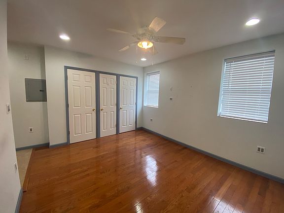 Living area off kitchen with plenty of storage.