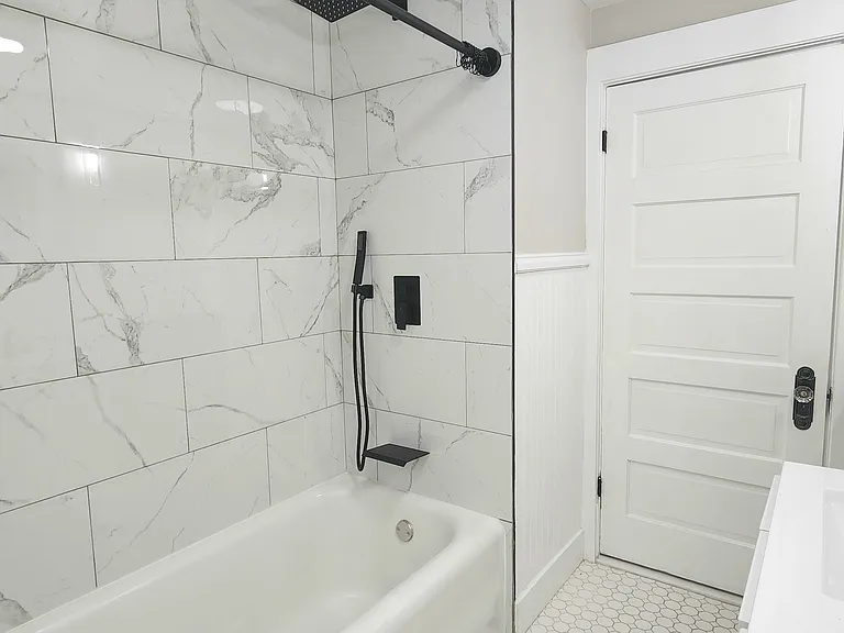 2nd floor full bath. Angle 1.