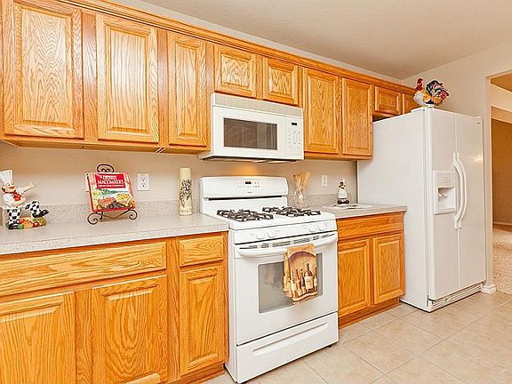 WARM KITCHEN SETTING WITH TILE FLOORING