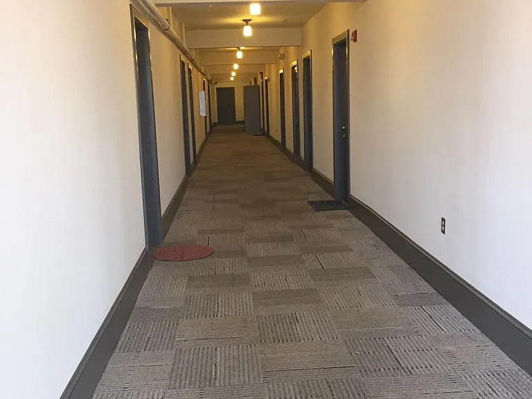 Well-lighted interior hallways