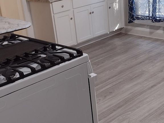 Bedroom 1 looking across kitchen.