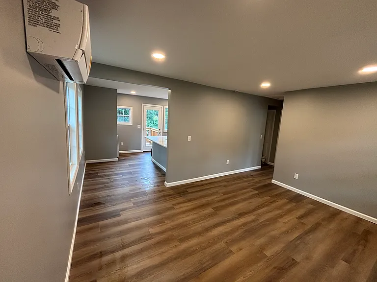 Living room looking into kitchen