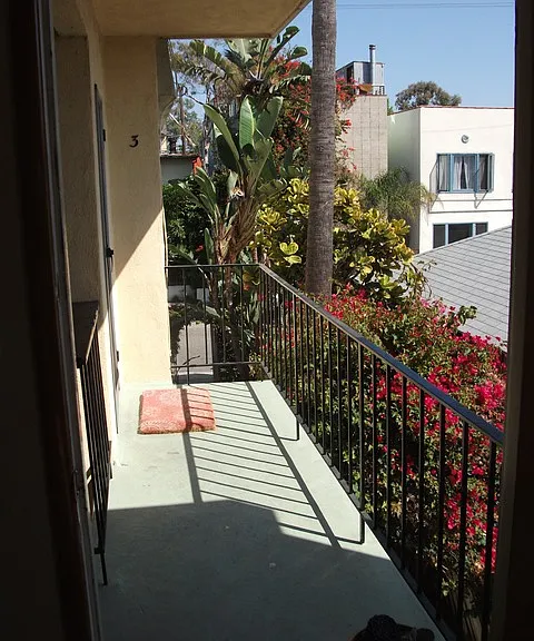 VIEW OUT THE FRONT DOOR OF APT 4