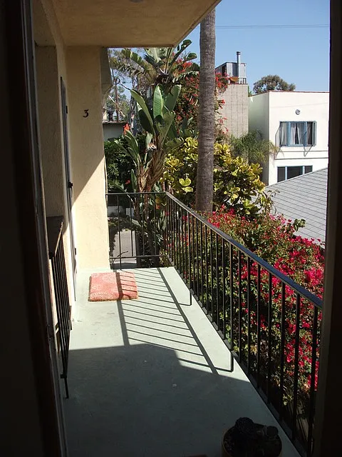VIEW OUT THE FRONT DOOR OF APT 4