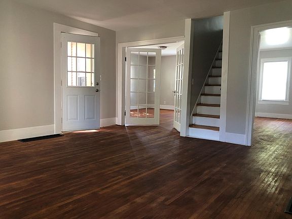 First Floor, refinished hardwood floors, tons of living space. Front porch, Living room, sitting room, bonus room, dining room.