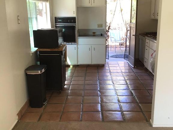 Kitchen goes out to back deck.