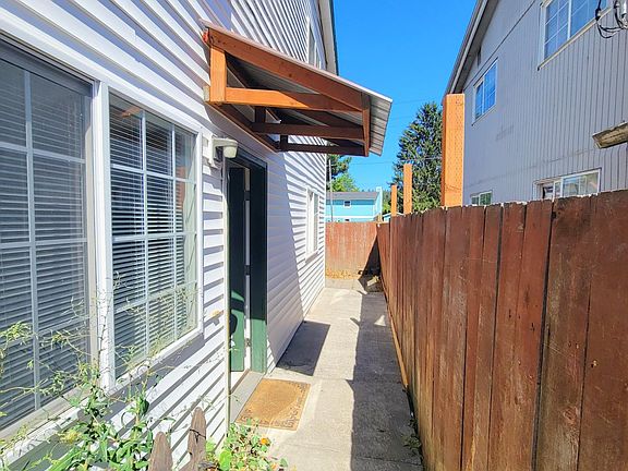 Through the gate and into the fully fenced, wraparound yard