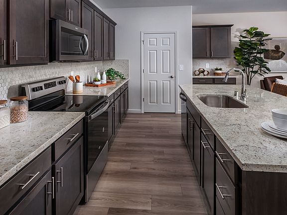 Residence 1 kitchen modeled at a nearby Meritage community.