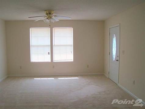 Bright Living room with brand new carpet and paint