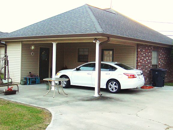 Attached carport and storage