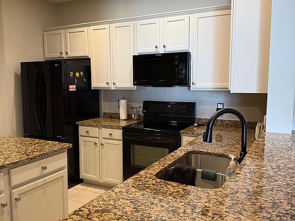 2nd image of 11345 Fergus St NE Unit G