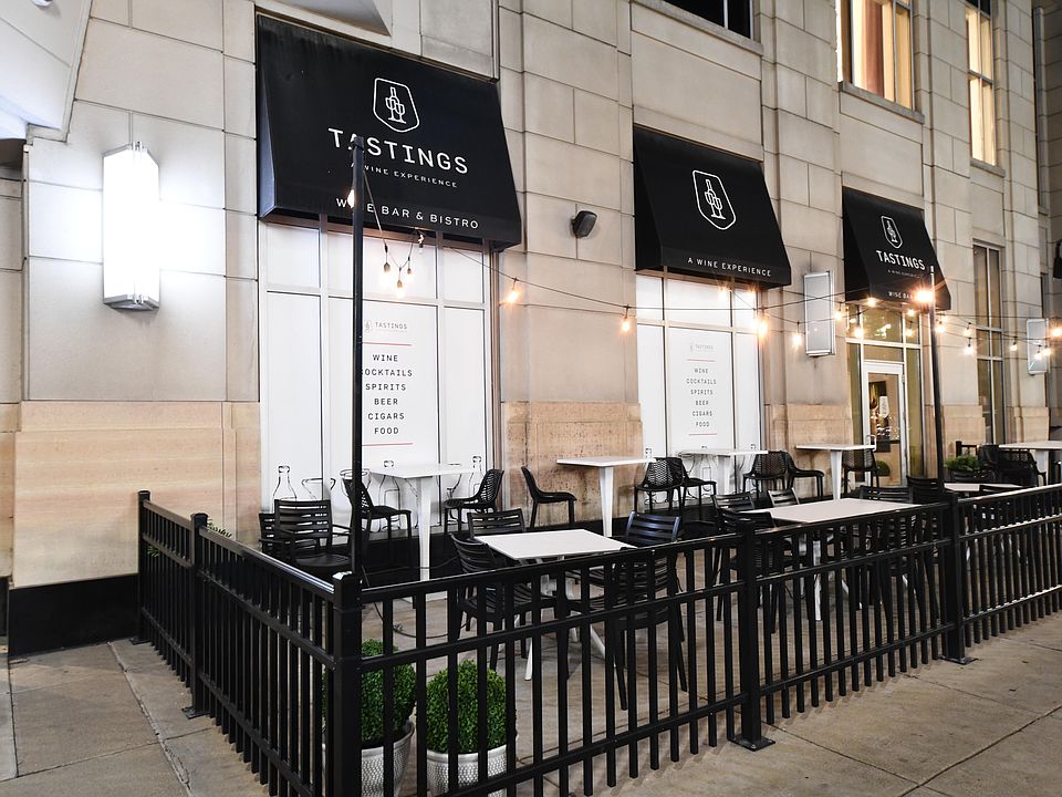 Wine night next door?? Yes
 Tastings offers wine tastings plus a menu of tapas, flatbreads & cheese plates.