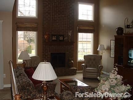 Large Great Room
						:
						Sunken family room with brick/gas fireplace. Room also has surround speakers.