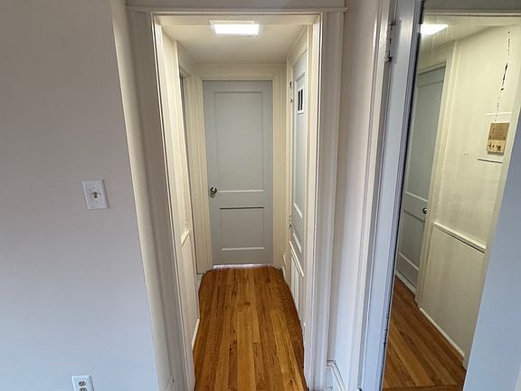 Hallway to bathroom and bedroom
