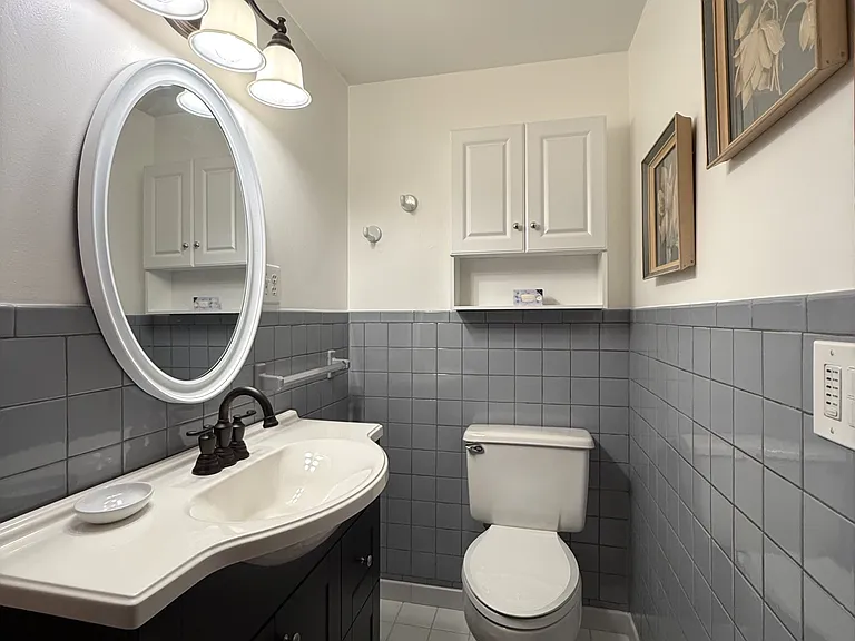 Room 1 private half bathroom