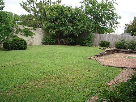 Back Yard with 12' Privacy Wall between 71st St