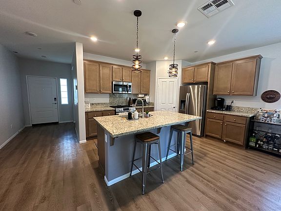 Kitchen with door to walk-in pantry