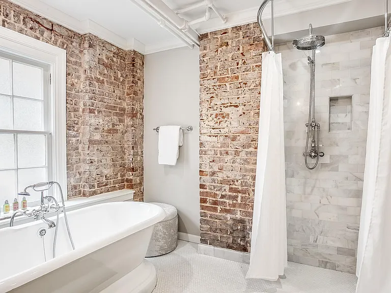 Large bathtub and shower.