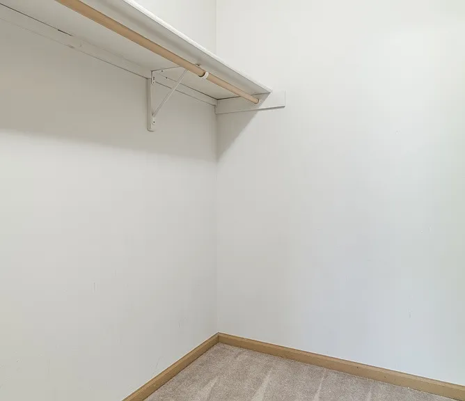 Large walk-in closets offer plenty of space to keep your wardrobe organized.