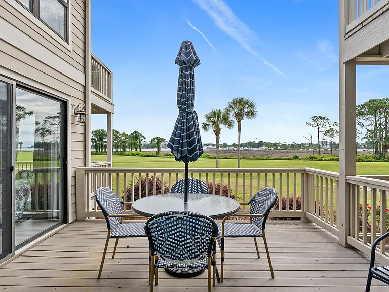 Dining area on deck off living and master bedroom