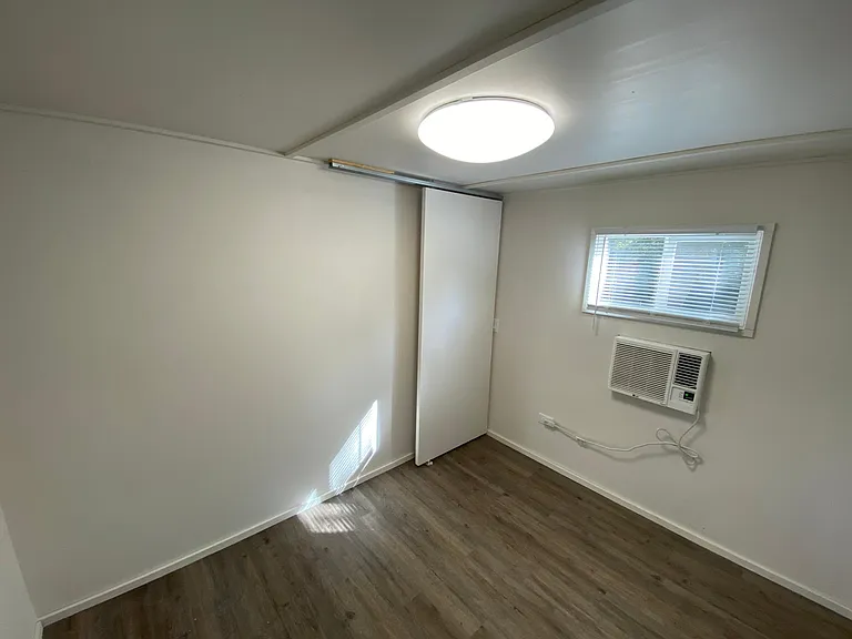 All led lighting, all new mini blinds and a new window unit heat / air combo in master bedroom