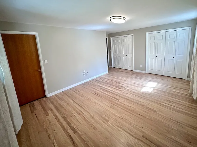 large primary bedroom with ensuite bathroom