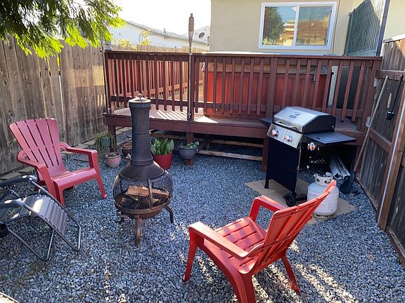 BBQ area next to Jacuzzi. Fenced in and private.