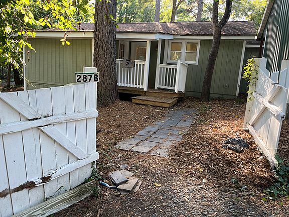 Front entry to the home and location for parking.