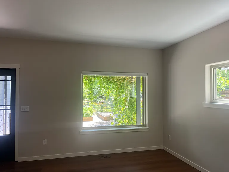 looking at front door and front bay window