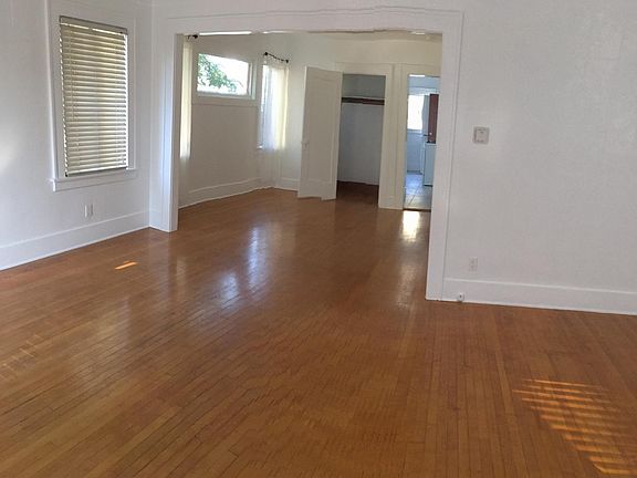This multi-use area near the entryway is suitable for dining or an office/workspace. Features two large closets and offers plenty of natural light.