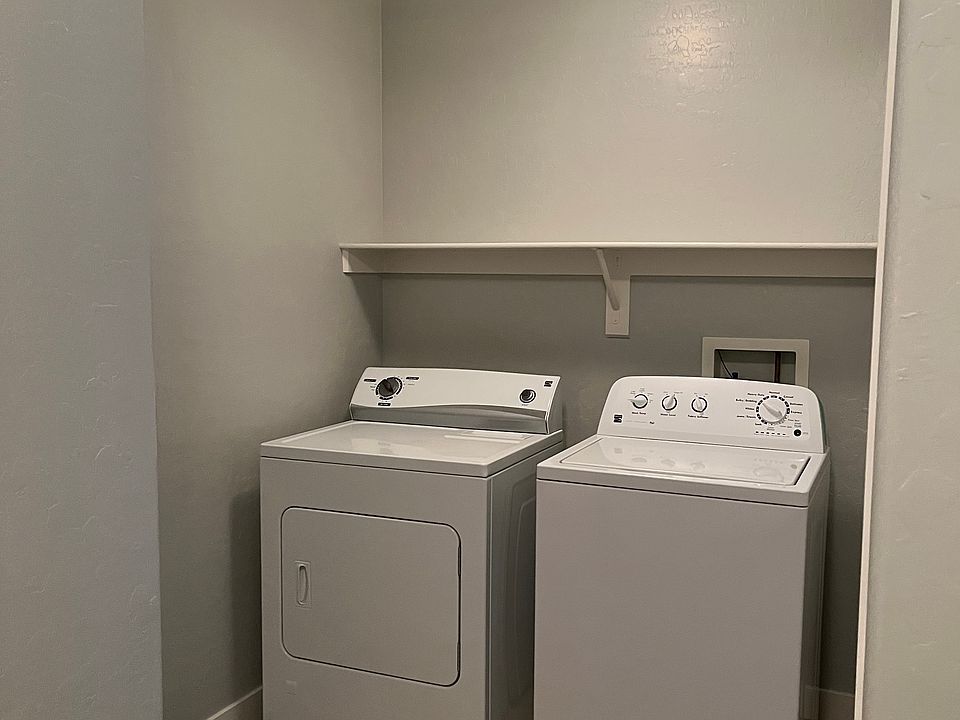 Spacious laundry room with closet