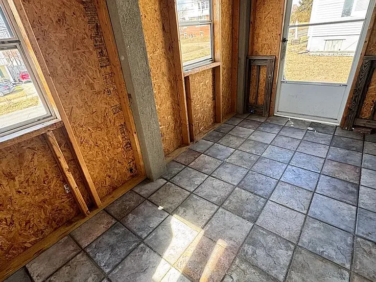 Framed in entry to the upstairs unit.