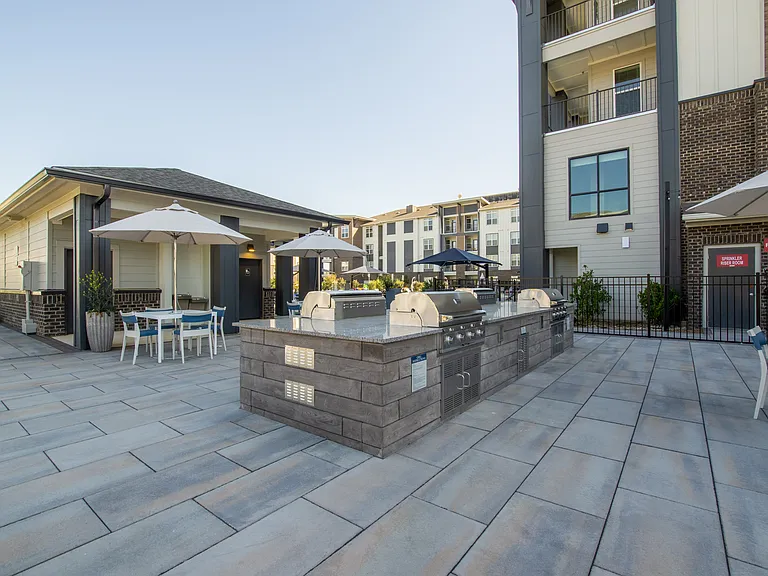 Grilling area by the pool to gather with your friends