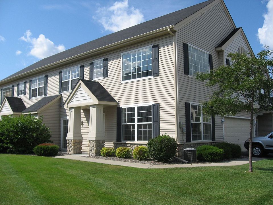 End unit, beautiful green space, 1 block to clubhouse