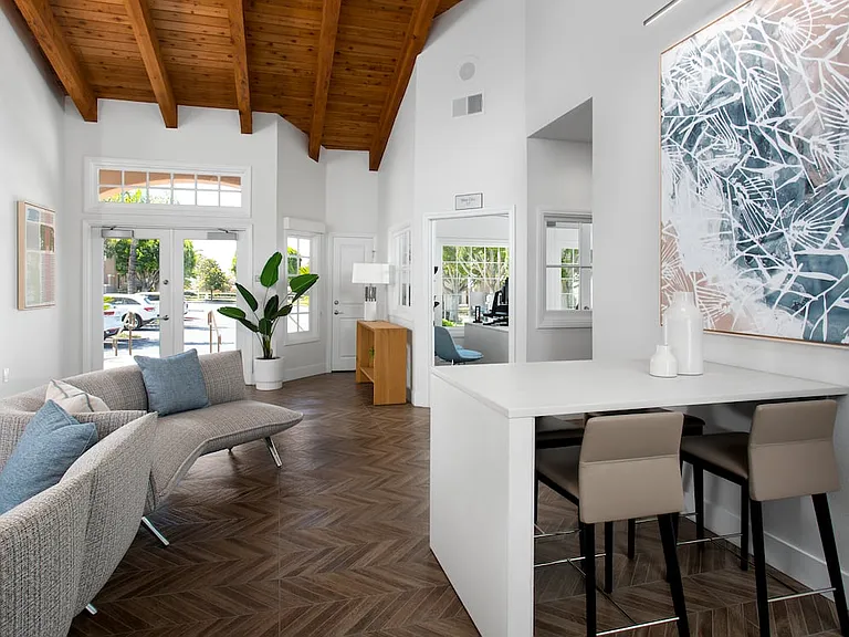 Resident lounge and leasing area with coworking spaces