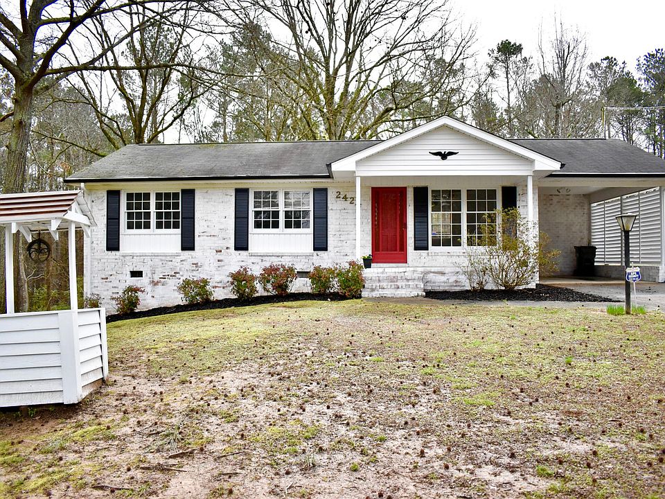 Artistic well in front of home