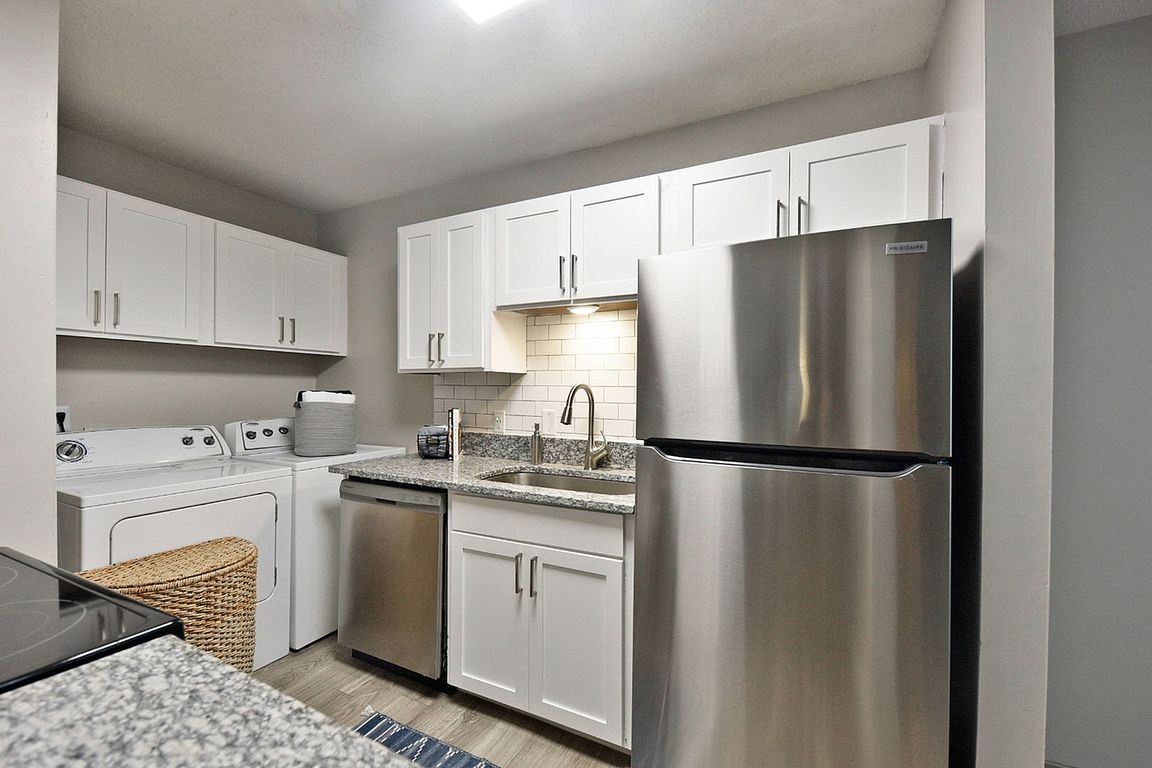 Kitchen with granite counters and stainless appliances