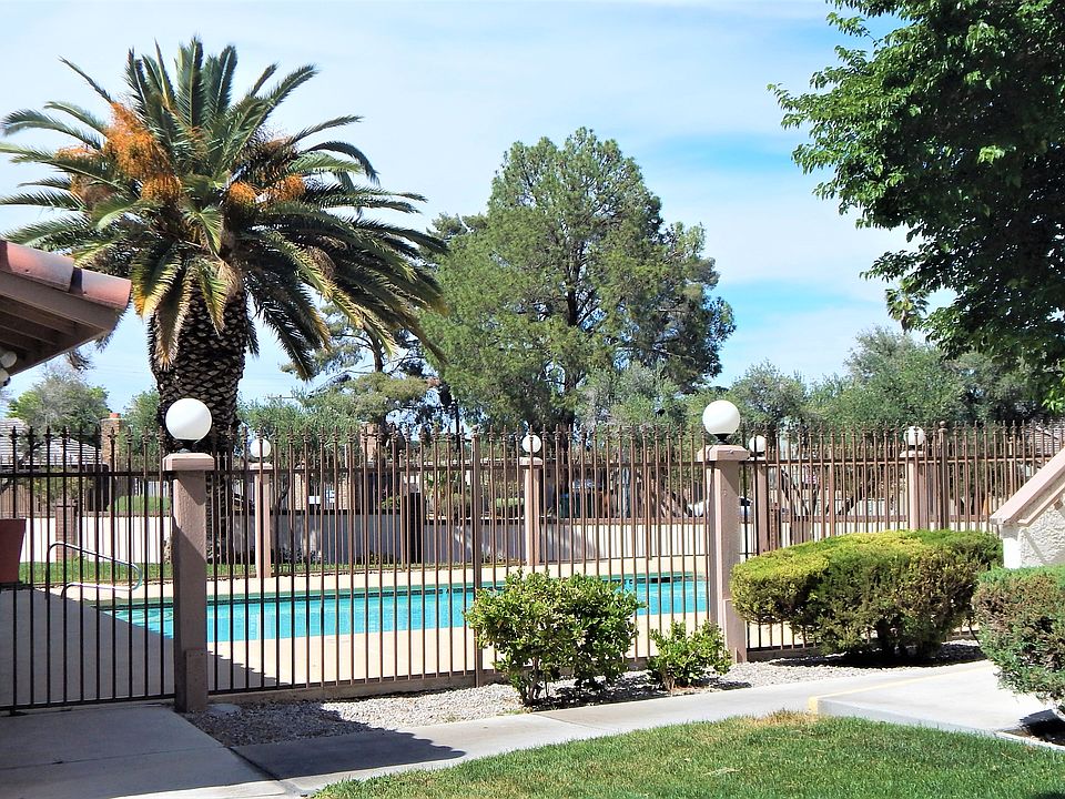 View to the Del Mar Downs community pool and clubhouse