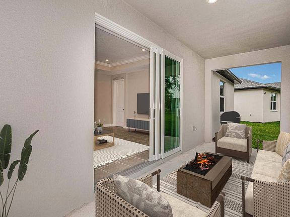 Sanibel new construction home plan outdoor living covered lanai by William Ryan Homes