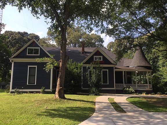 Side of the main house. Stairs to the apartment are just to the right of the foreground.
