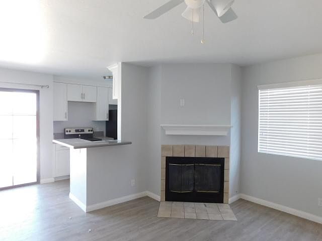 Living Room with Fireplace & Outlet for TV above Mantel
