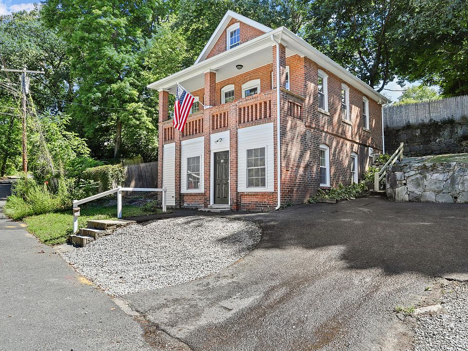 2nd floor apartment with entrance in rear (off street driveway parking shared with first floor tenant)
