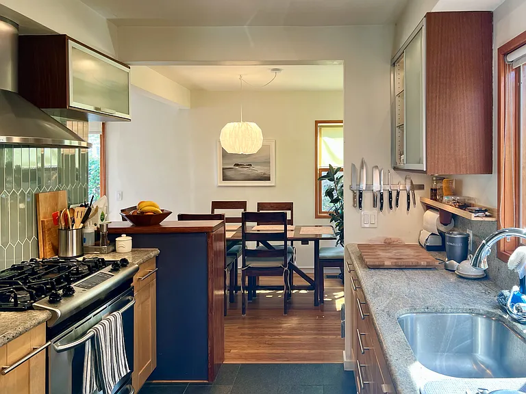 Kitchen and Dining beyond; granite countertop