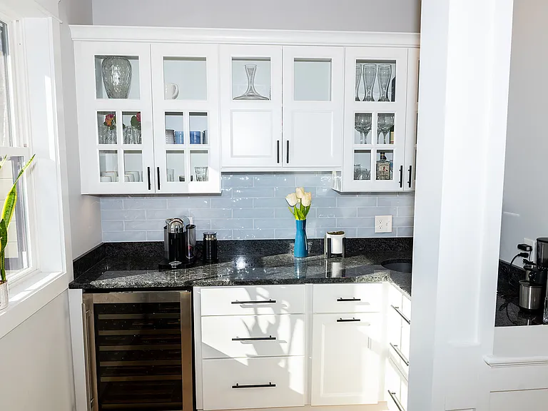 Wet bar with wine fridge and beverage fridge