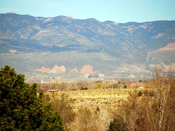 "Views include Pikes Peak, Garden of the Gods and Downtown Colorado Springs"