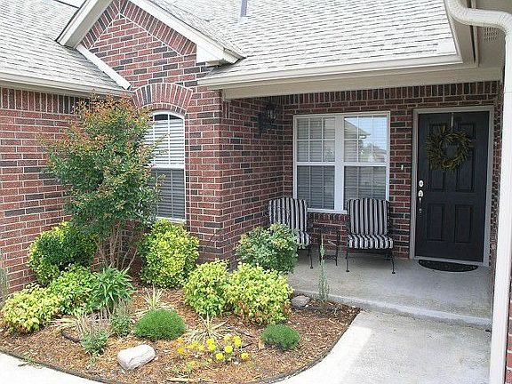 Front porch with landscaping.