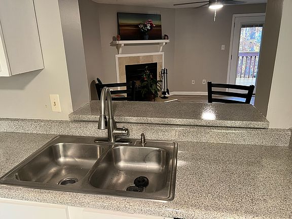 Wood-burning fireplace. Entire house is equipped with wireless smoke and CO alarms....one alarm activates all alarms at same time.