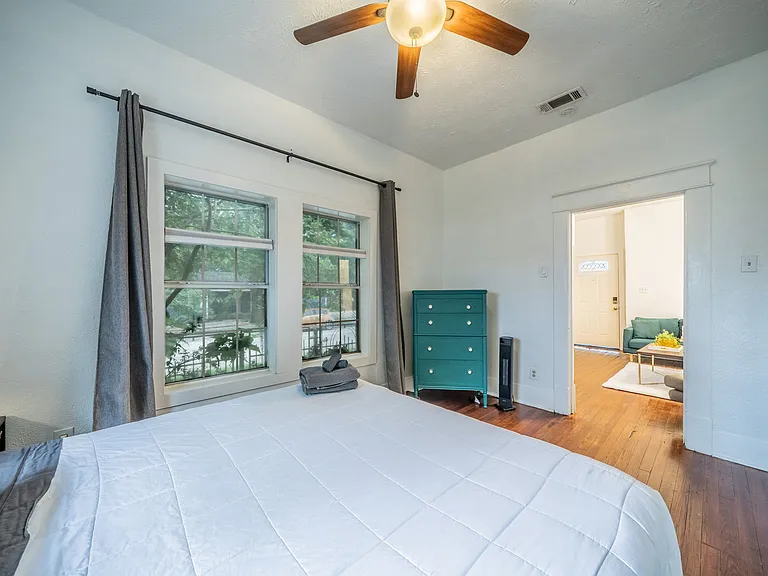 Wake up to natural light in our comfortable, open-concept suite.